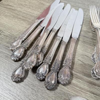LOT 135K: International Sterling Brocade Silverware Set (1644.6gtw - not including knives)