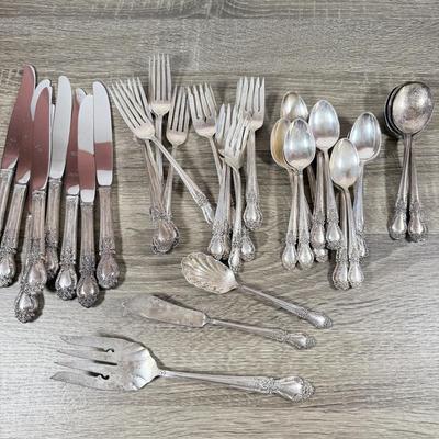 LOT 135K: International Sterling Brocade Silverware Set (1644.6gtw - not including knives)