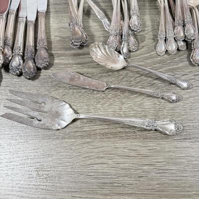 LOT 135K: International Sterling Brocade Silverware Set (1644.6gtw - not including knives)