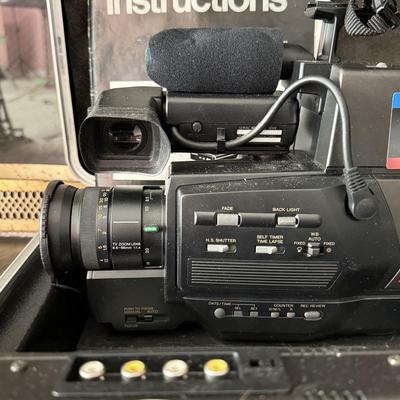 LOT 162F: Vintage Panasonic OmniMovie VHS Video Camera Model PV-420 w/ Hard Shell Case, Operating Instructions & Accessories