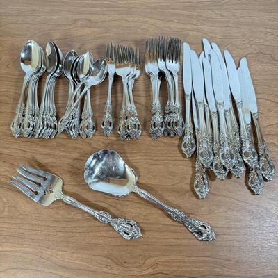 LOT 170K: Oneida Elegant Stainless Steel Flatware Set