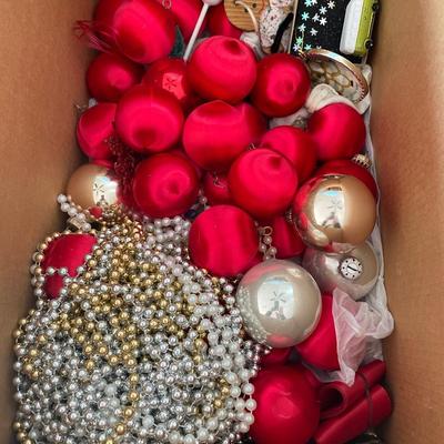 Sale Photo Thumbnail #518: Box of vintage red ornaments and bed garland