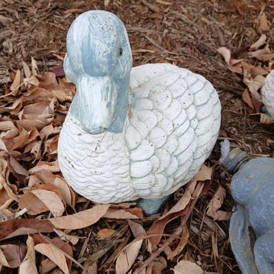 Two hard plastic ducks and a frog sprinkler