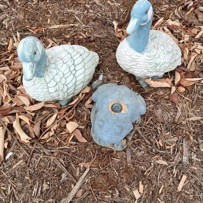 Two hard plastic ducks and a frog sprinkler