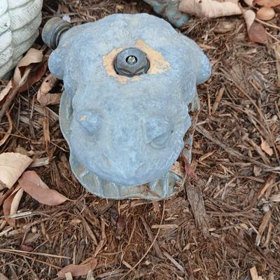 Two hard plastic ducks and a frog sprinkler