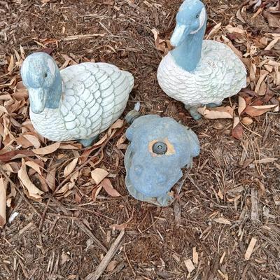 Two hard plastic ducks and a frog sprinkler