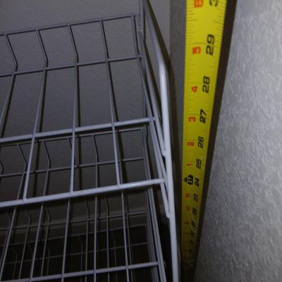 Metal shelf for organizing closet, Mesh laundry hamper and a bunch of coat hangers