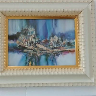 Two framed pictures - "Rock frost" Gouache By Carolyn Evridge and tree swing signed RL and a colorful picture of abstract trees