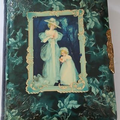 Antique Victorian Celluloid Photo Album Woman w Child e.1900's with Antique made in Japan porcelain doll and a Victorian picture frame