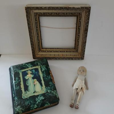 Antique Victorian Celluloid Photo Album Woman w Child e.1900's with Antique made in Japan porcelain doll and a Victorian picture frame