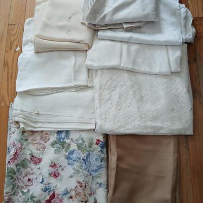 Table linens - nice lace, and other beautiful, patterned tablecloths