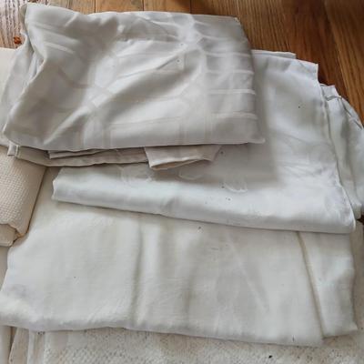 Table linens - nice lace, and other beautiful, patterned tablecloths