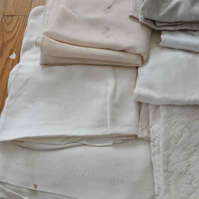 Table linens - nice lace, and other beautiful, patterned tablecloths