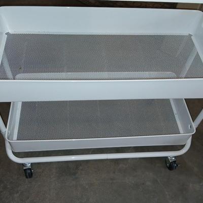 White metal cart with clothes iron