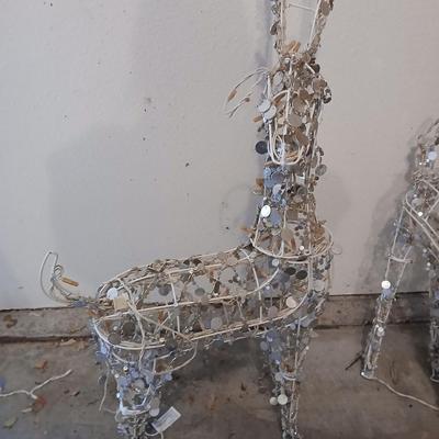 Three Christmas deer yard decor