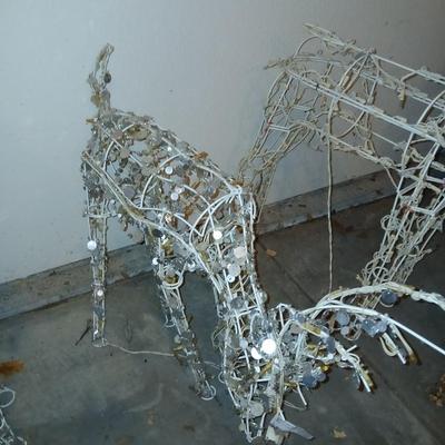 Three Christmas deer yard decor