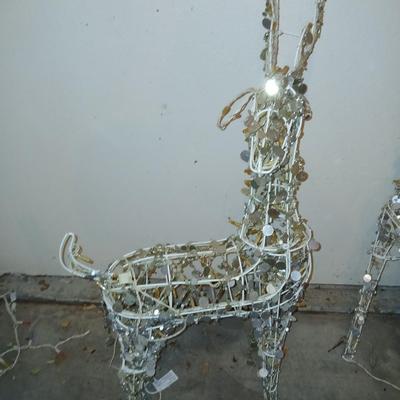 Three Christmas deer yard decor