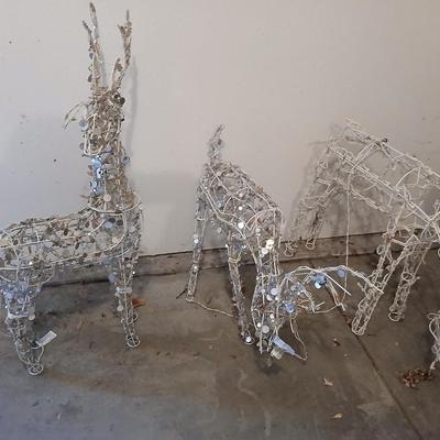 Three Christmas deer yard decor