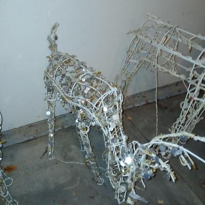 Three Christmas deer yard decor