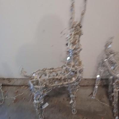 Three Christmas deer yard decor