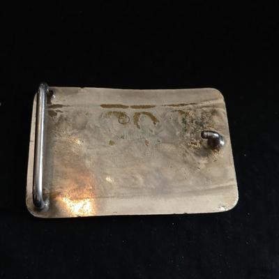 Vintage longhorn belt buckle with art deco bolo tie