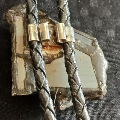 Vintage longhorn belt buckle with art deco bolo tie