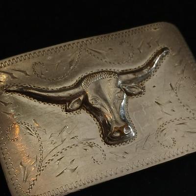 Vintage longhorn belt buckle with art deco bolo tie