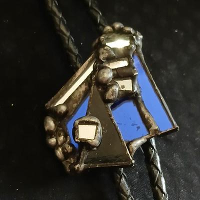 Vintage longhorn belt buckle with art deco bolo tie