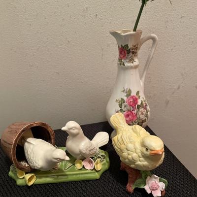 Green and gold candle holder with birds and vase