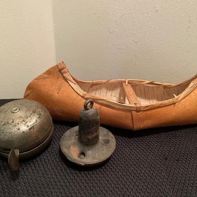Vintage bell, anchor, pins, sharpener and paper canoe