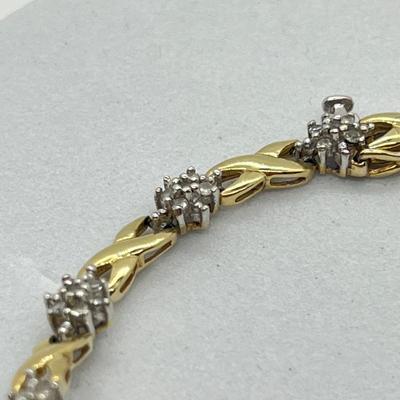 LOT 27J: 10K Gold and Diamond 7” Bracelet - 6.1 gtw- Kisses and Hugs Design