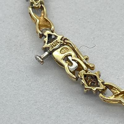 LOT 27J: 10K Gold and Diamond 7” Bracelet - 6.1 gtw- Kisses and Hugs Design