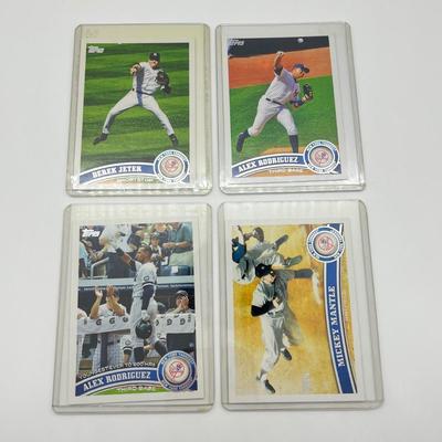 LOT 39J: 32 2011 Topps Baseball Cards - Jeter, Pujols, Ichiro, and More