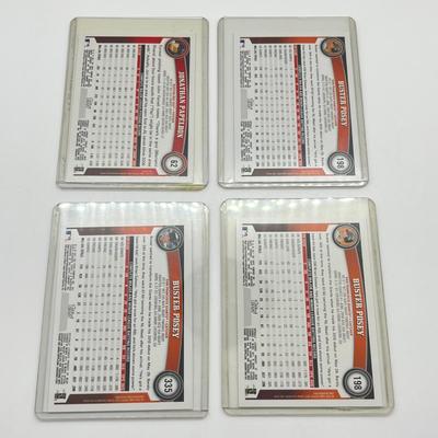 LOT 39J: 32 2011 Topps Baseball Cards - Jeter, Pujols, Ichiro, and More