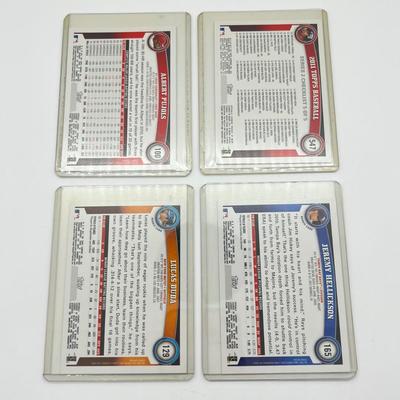 LOT 39J: 32 2011 Topps Baseball Cards - Jeter, Pujols, Ichiro, and More