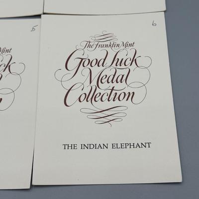 LOT 44: 1977 Franklin Mint Good Luck Sterling Silver Medal Collection - 12 Medals + COAs