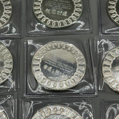 LOT 44: 1977 Franklin Mint Good Luck Sterling Silver Medal Collection - 12 Medals + COAs