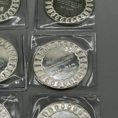 LOT 44: 1977 Franklin Mint Good Luck Sterling Silver Medal Collection - 12 Medals + COAs