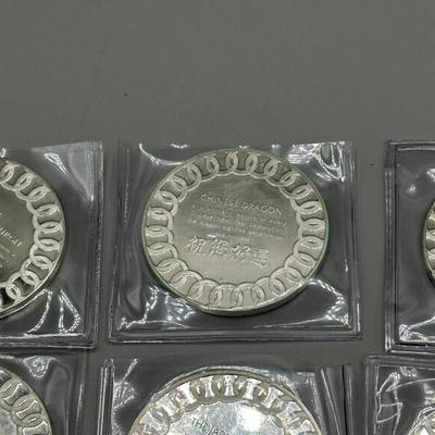 LOT 44: 1977 Franklin Mint Good Luck Sterling Silver Medal Collection - 12 Medals + COAs