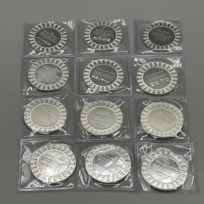 LOT 44: 1977 Franklin Mint Good Luck Sterling Silver Medal Collection - 12 Medals + COAs