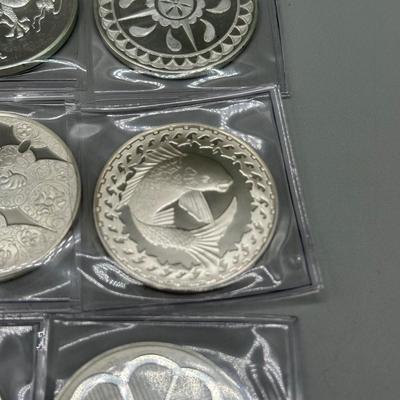 LOT 44: 1977 Franklin Mint Good Luck Sterling Silver Medal Collection - 12 Medals + COAs