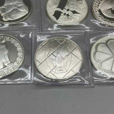 LOT 44: 1977 Franklin Mint Good Luck Sterling Silver Medal Collection - 12 Medals + COAs