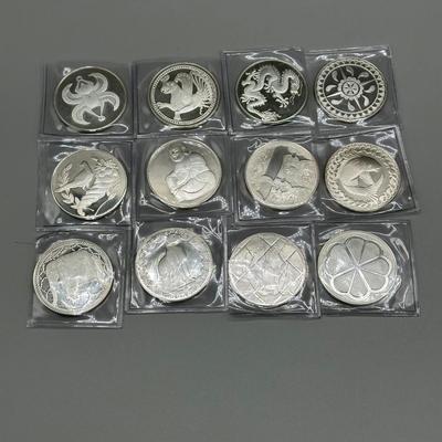 LOT 44: 1977 Franklin Mint Good Luck Sterling Silver Medal Collection - 12 Medals + COAs