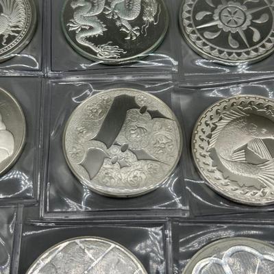 LOT 44: 1977 Franklin Mint Good Luck Sterling Silver Medal Collection - 12 Medals + COAs