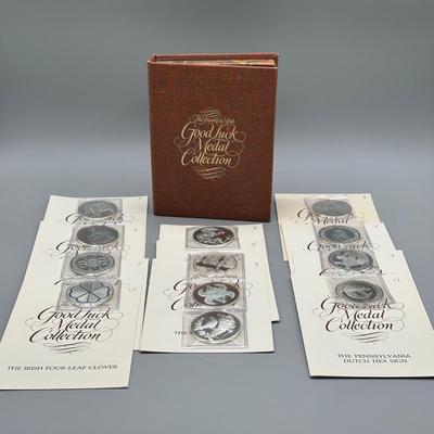 LOT 44: 1977 Franklin Mint Good Luck Sterling Silver Medal Collection - 12 Medals + COAs