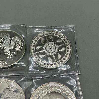 LOT 44: 1977 Franklin Mint Good Luck Sterling Silver Medal Collection - 12 Medals + COAs