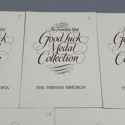 LOT 44: 1977 Franklin Mint Good Luck Sterling Silver Medal Collection - 12 Medals + COAs
