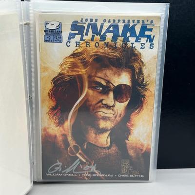 LOT 45: Collection of Signed Snake Plissken Chronicles Comic Books and More