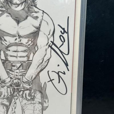 LOT 45: Collection of Signed Snake Plissken Chronicles Comic Books and More