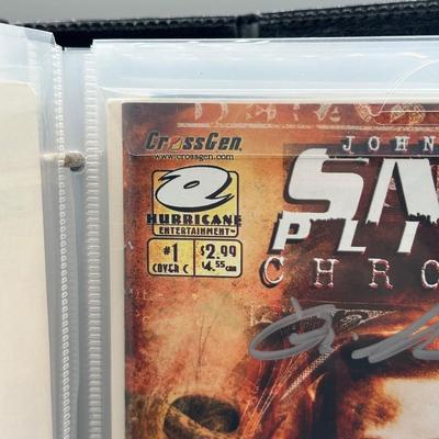 LOT 45: Collection of Signed Snake Plissken Chronicles Comic Books and More